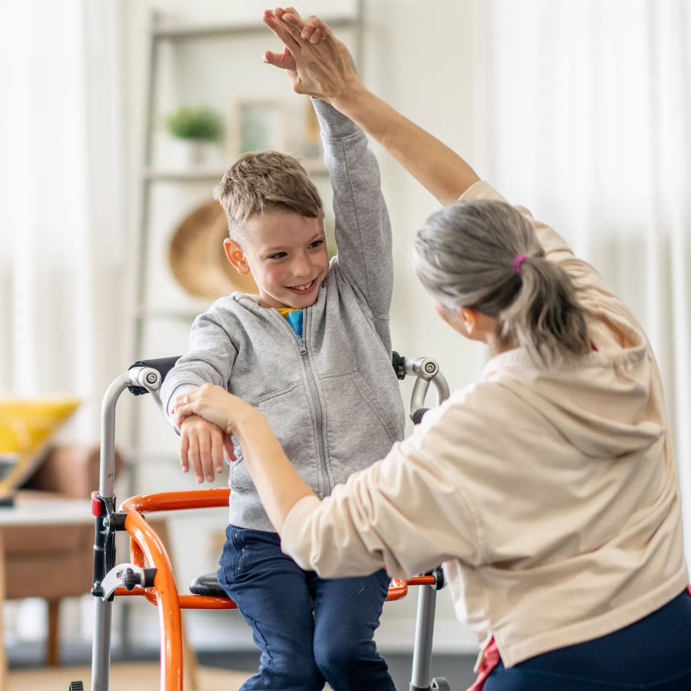 Therapist working with child on balance activities